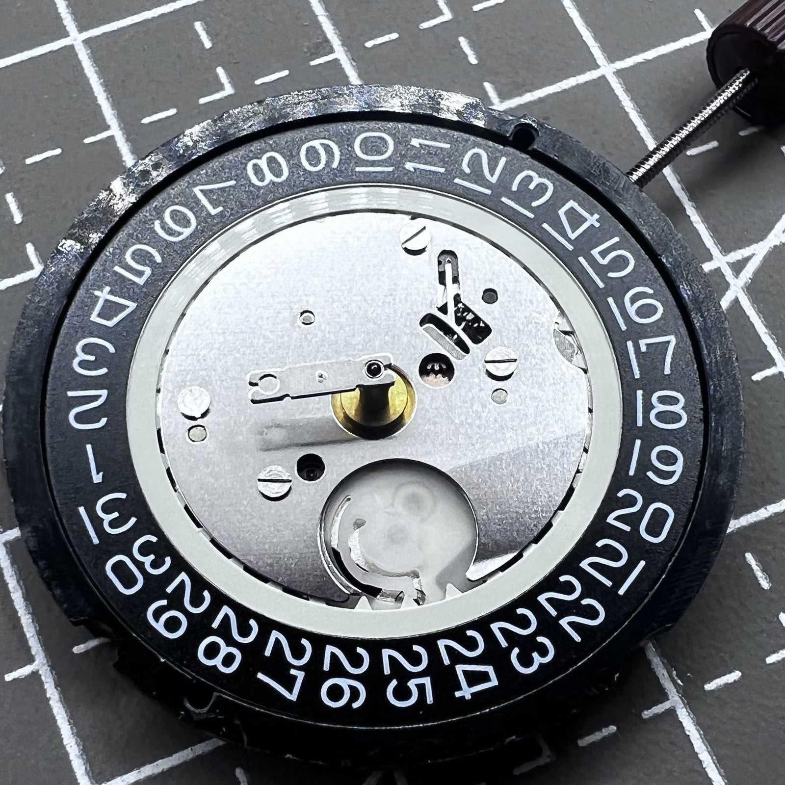 Swiss Ronda 515 quartz movement with black HCP3 disk and date display at 3 o?clock watch accessory.
