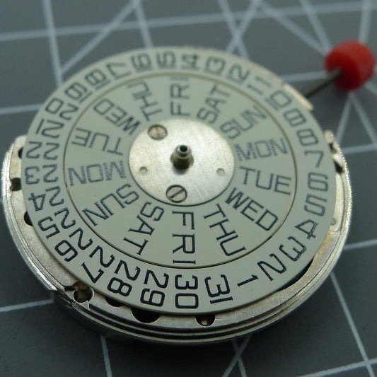 Swiss Made ESA9181 silver watch part with quartz movement and double calendar functionality.