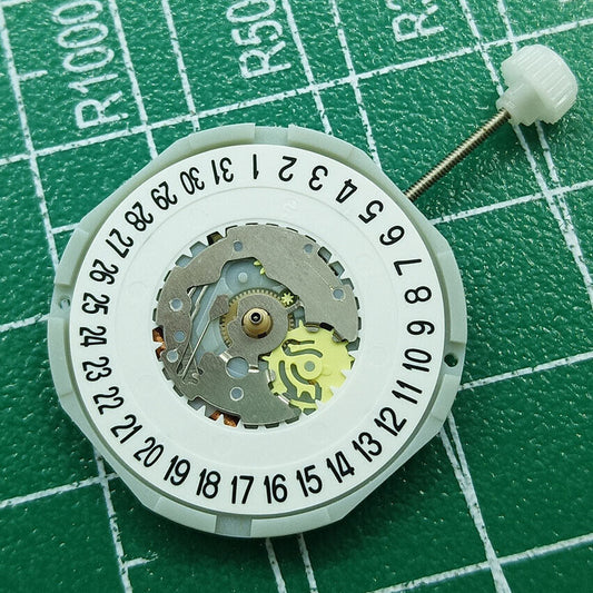 Sunon PE28 quartz watch movement with 3 hands and date at 6, ideal for watch repair.