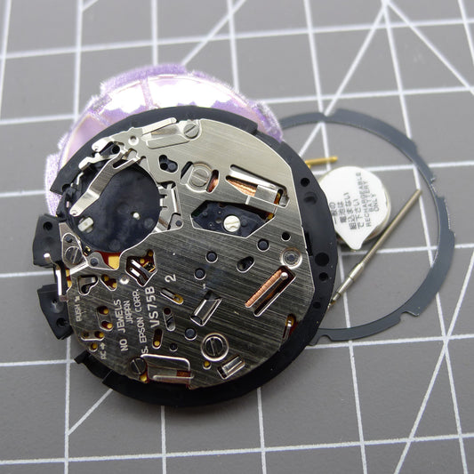 Japan Made Hattori Epson TMI VS75B solar-powered quartz watch movement for precise timekeeping.