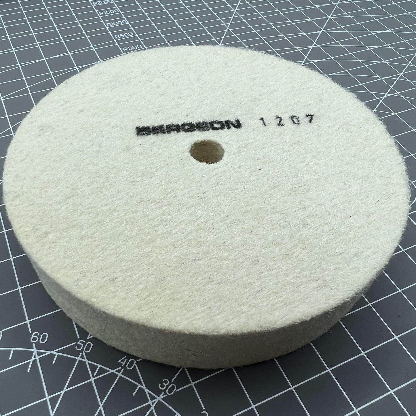 Swiss Bergeon 1207 white felt polishing wheel for precise watch accessory finishing and polishing.