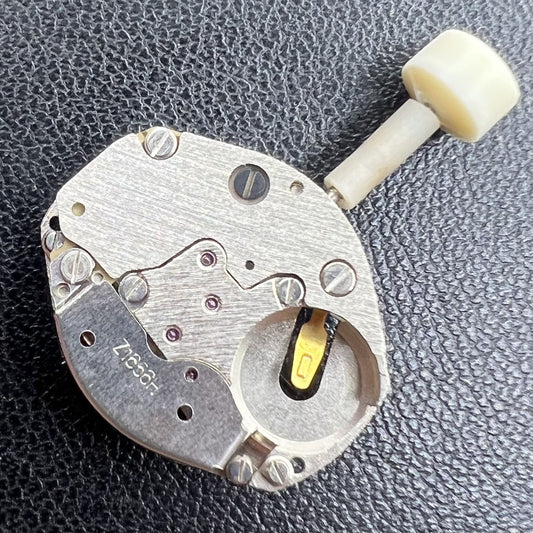 Old Stock Poljot Z1656H quartz watch movement with three-hand design, precise timekeeping accessory.