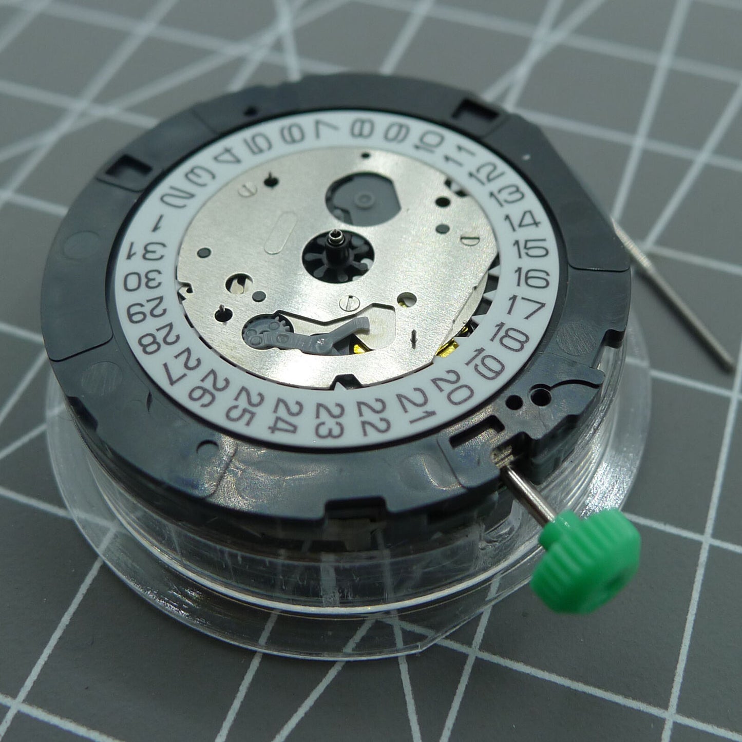 Japan Made Miyota OS20 quartz watch movement with date at 4.5, perfect for precise watchmaker repairs.
