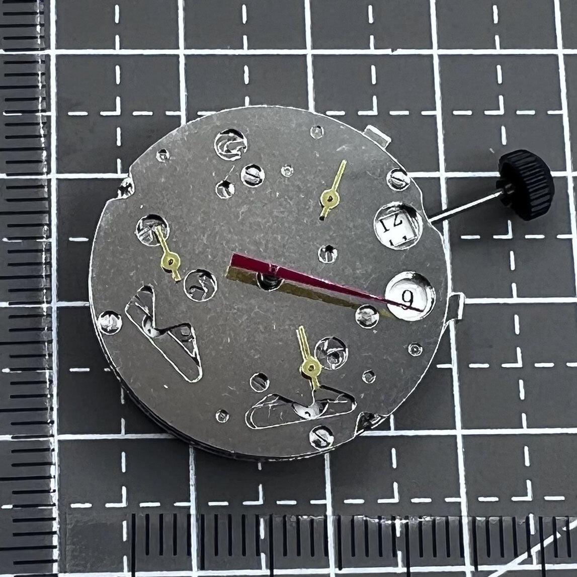 Tianjin T16 watch with automatic mechanical movement and small seconds at 2, 6, and 10 o'clock positions.