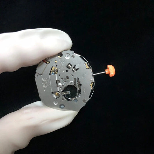 Miyota JP15 Japan Quartz watch movement showing date at 3 o'clock for precise timekeeping.