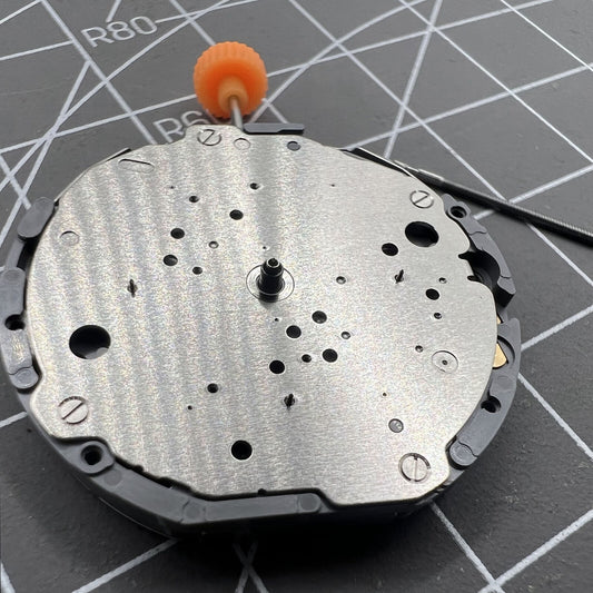 Japan Miyota JS10 quartz watch movement with small second hand at 6, 9, and 12 o?clock positions.