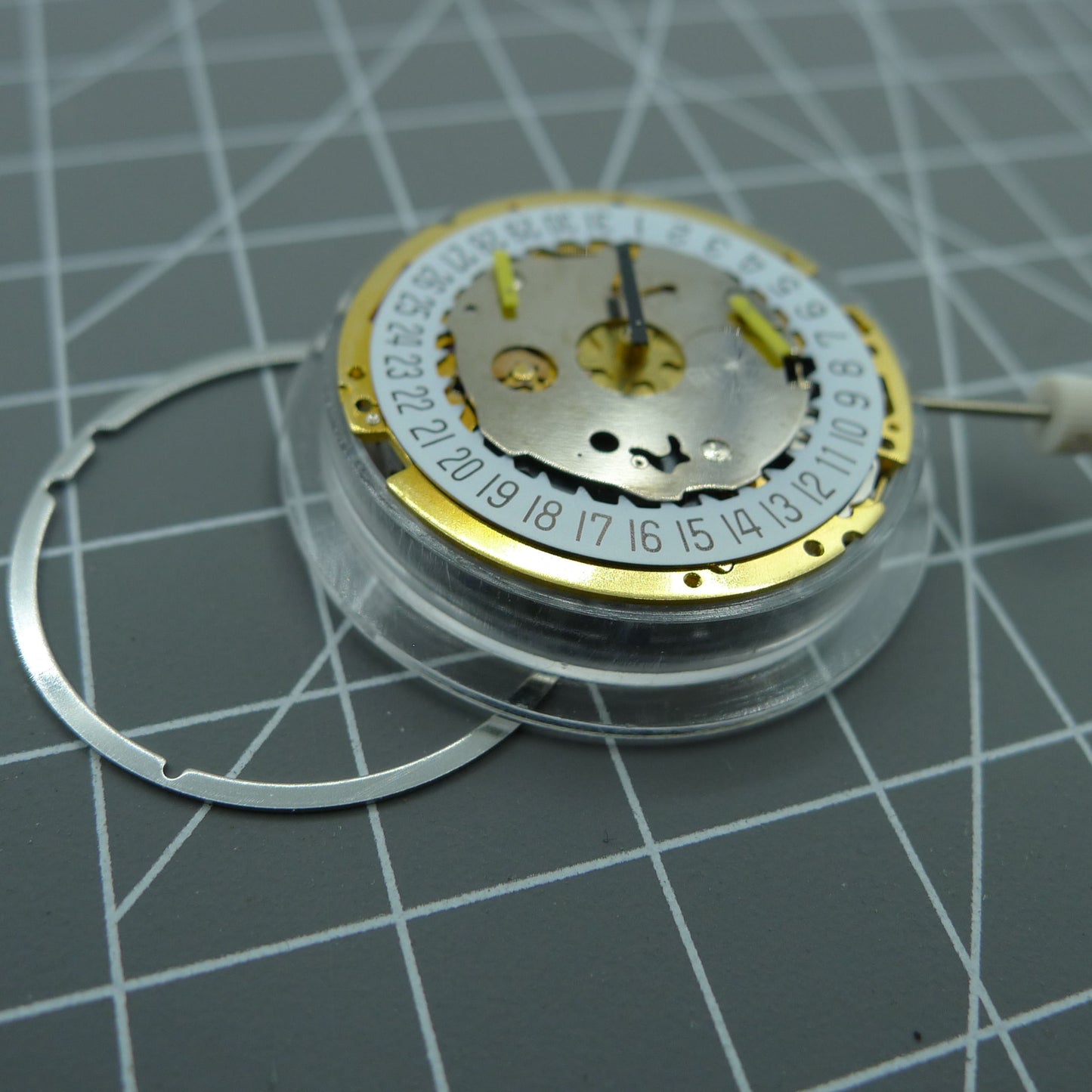Swiss Made ISA 8171 watch accessory, quartz movement with date at 6 and multifunctional dial.