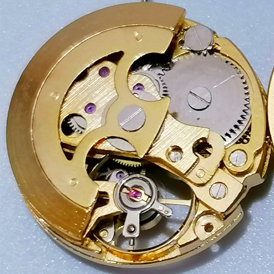 Golden hollow 26.5mm 7120 automatic mechanical watch movement for precision timepieces.