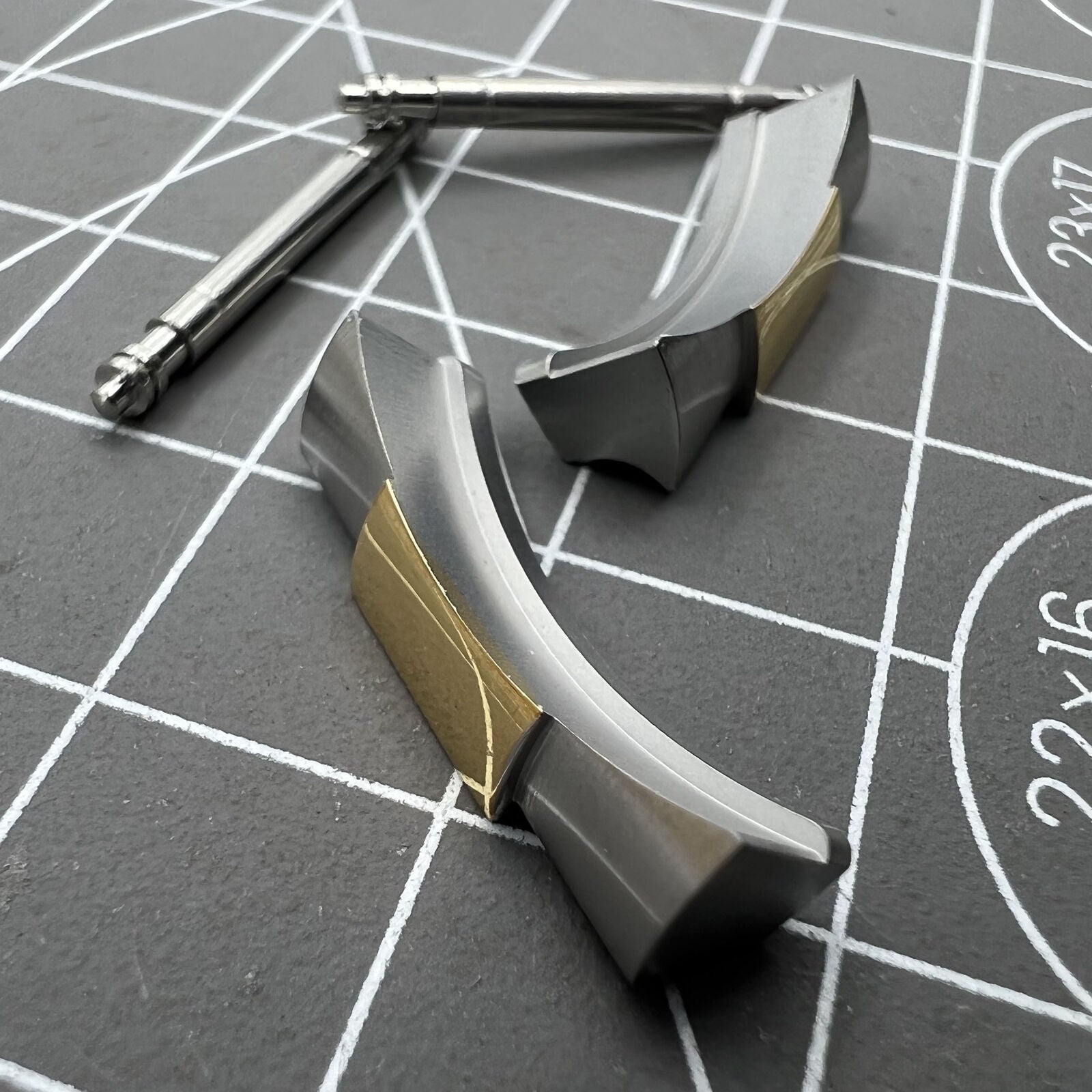 Curved stainless steel end links for Daytona watch band, 20/21mm, durable and precise fit.