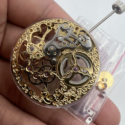 Seagull ST3600 mechanical watch movement with golden hollow design, ETA 6497 style, second hand at 9 o'clock.