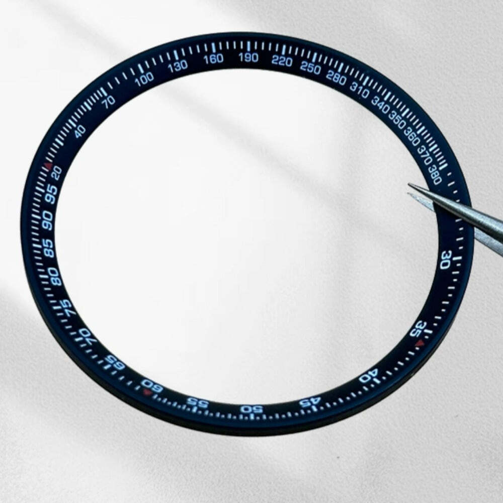 Black metal modified chapter ring 37x31.5mm, enhancing watch dial style and accuracy.
