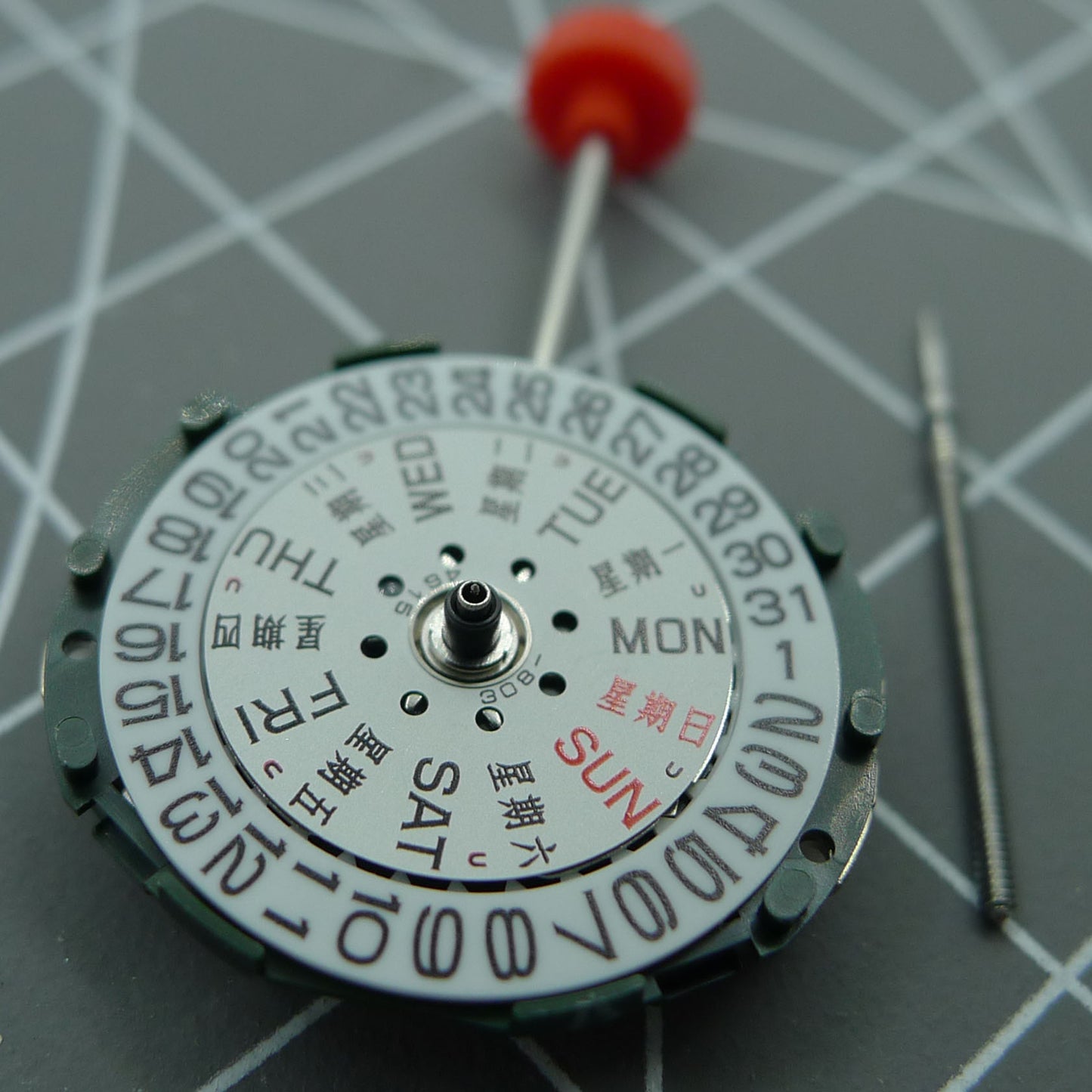 Japan-made Miyota/Citizen 2005 quartz movement with day-date function and stem for precise watch repair.