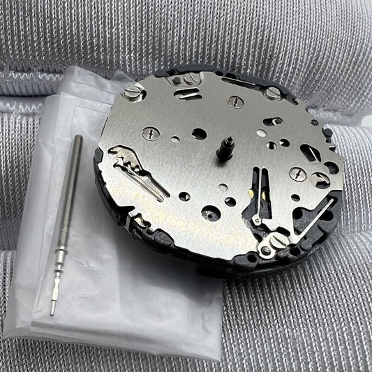Japan Made Hattori Epson TMI VH63 VH63A quartz watch movement showing intricate mechanical components for precise timekeeping.