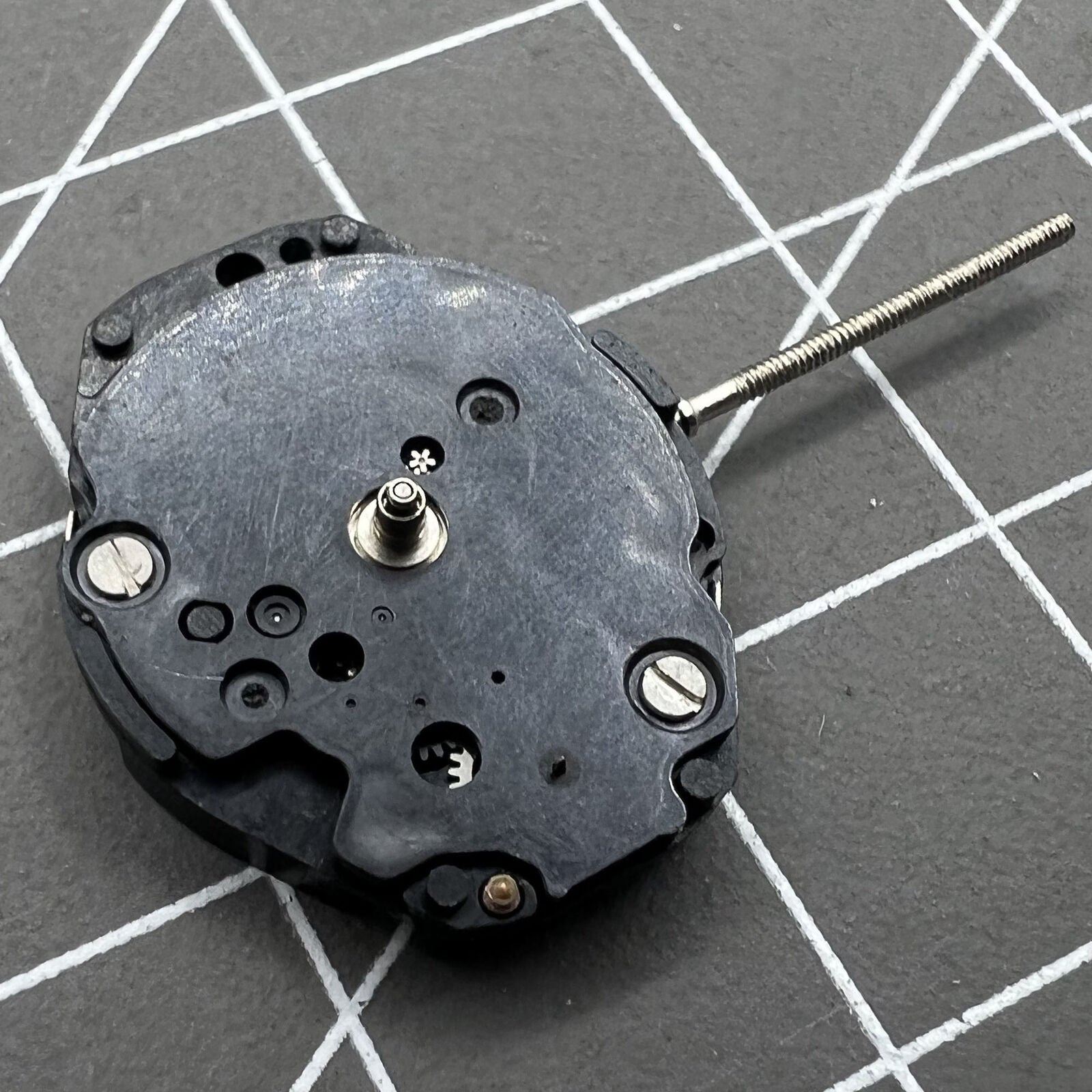 Hattori VX07E quartz watch movement showing 2 hands and small second for precise timekeeping