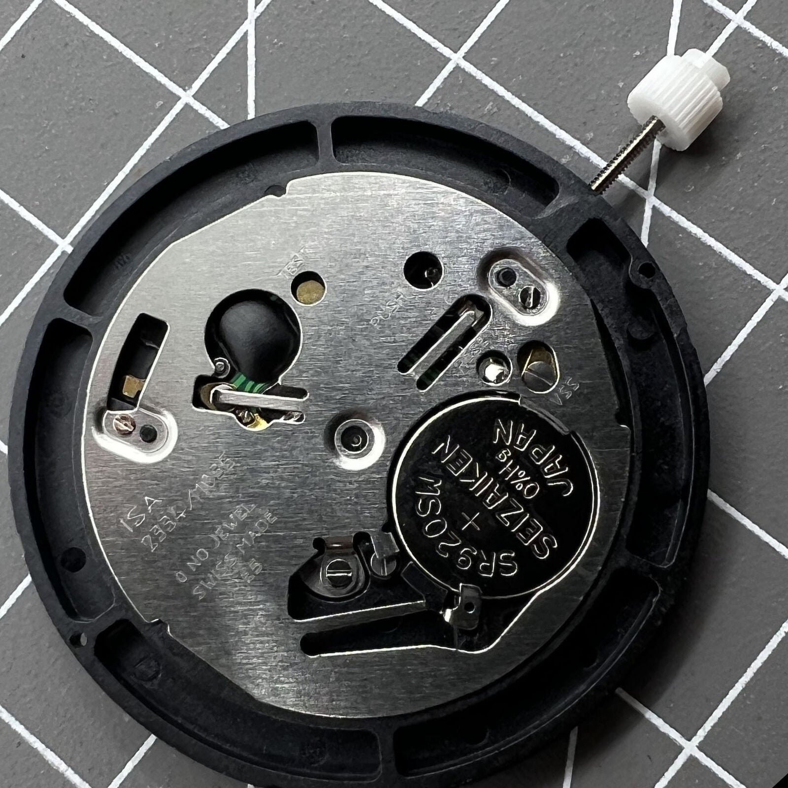 Black dial quartz watch movement ISA 2334/1035 by ISA for precise and reliable timekeeping replacement.