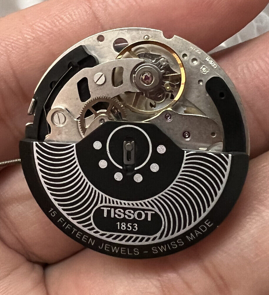 ETA C01.211 Swiss Made chronograph watch movement with black dial, mechanical precision by Tissot 1853.