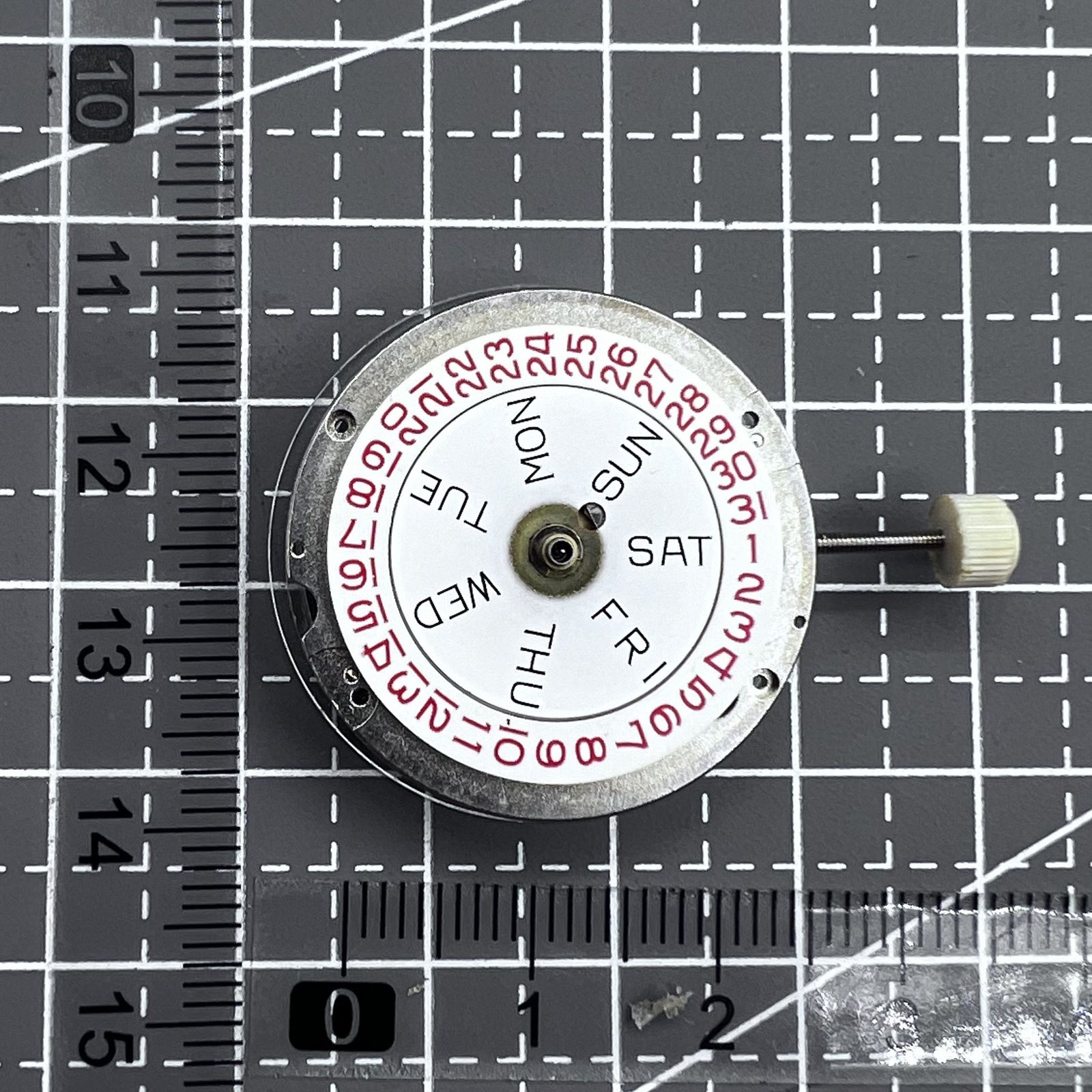 Swiss RONDA MATIC 1217-21 manual watch movement in repair, precision components visible.