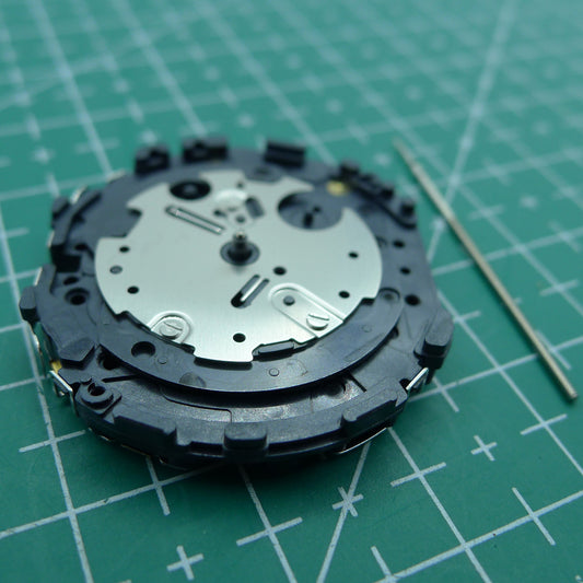 Hattori Epson TMI VL57 Quartz watch movement, precision made in Japan for reliable timekeeping.