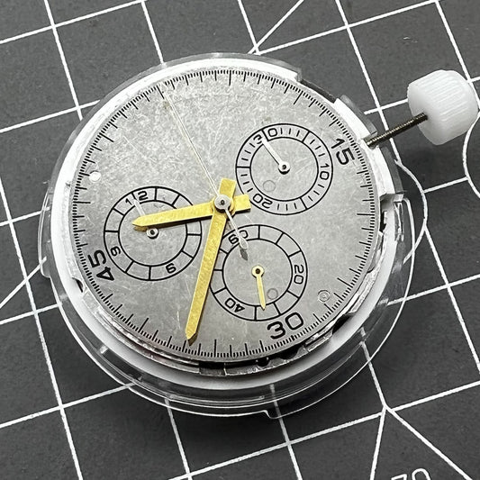 Chinese 4130 automatic watch movement displaying small seconds at 3, 6, and 9 o'clock positions.