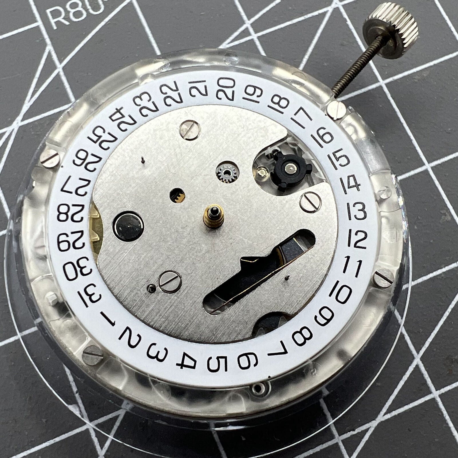 Tissot ETA C01.211 chronograph movement with white dial, precise Swiss watch accessory for repairs and upgrades.