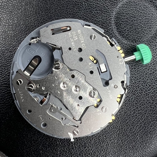 Miyota OS25 quartz movement with date display at 4 o'clock, reliable Japanese watch mechanism