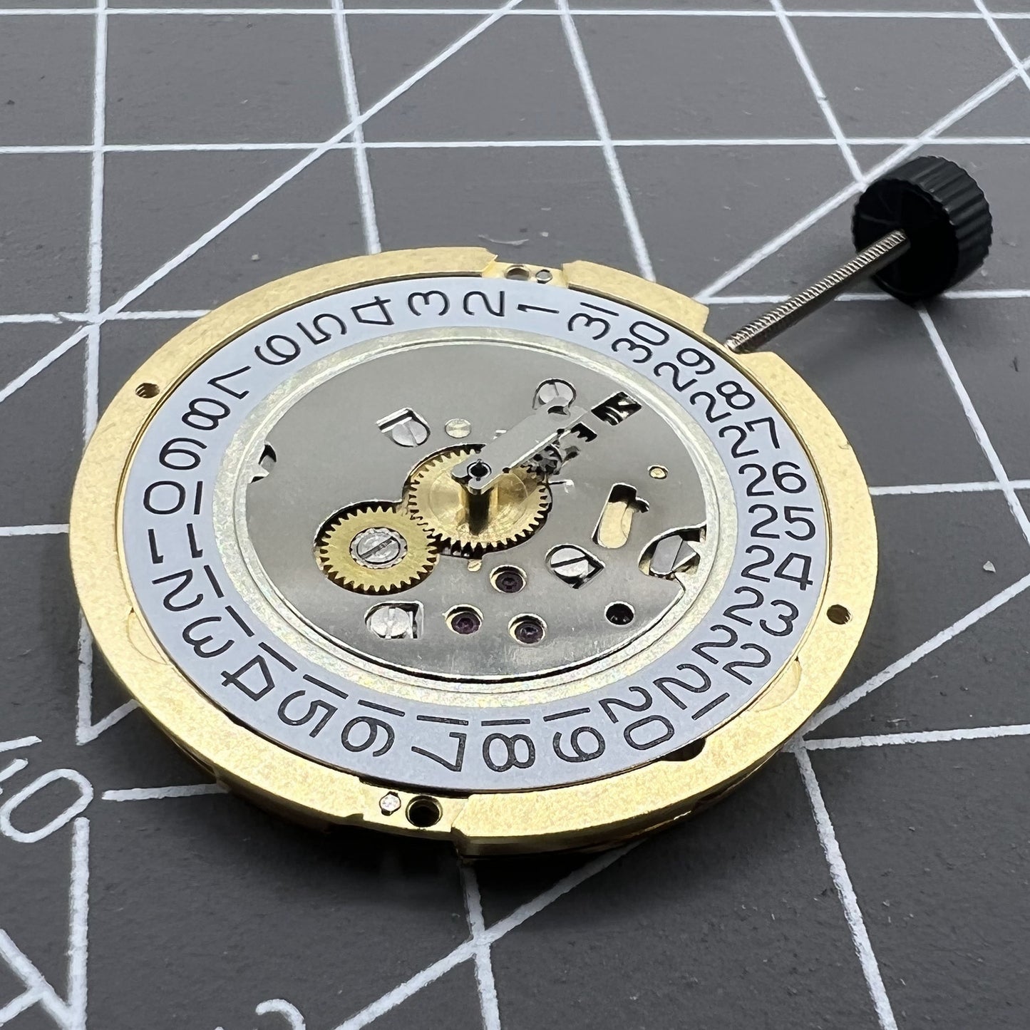 Swiss Made Ronda 1005 Slimtech quartz movement, slim and precise watch accessory for reliable timekeeping.