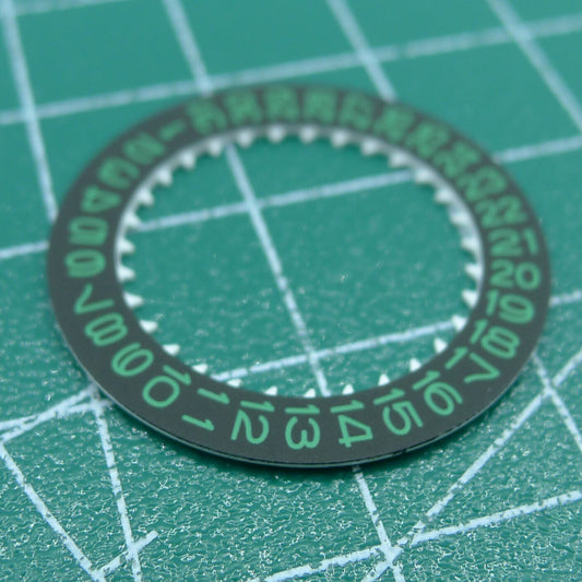 Green date disk with black background for NH35 watch movement, enhancing date visibility and accuracy.