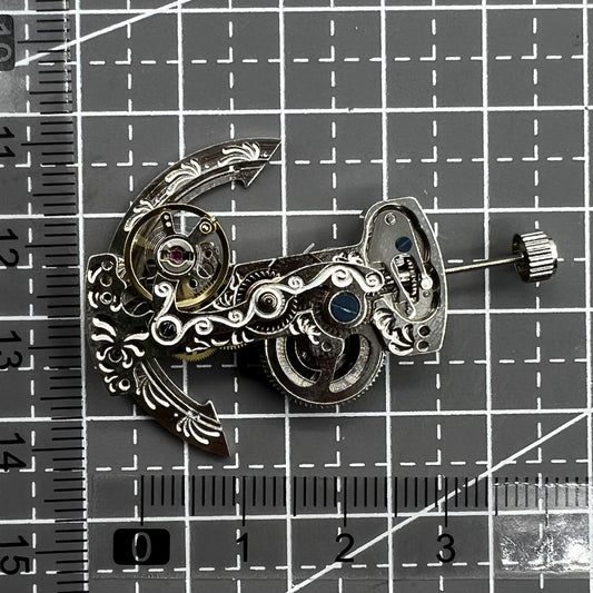 Bar shape bare balance wheel showcasing precise automatic mechanical movement for watch repair and assembly.