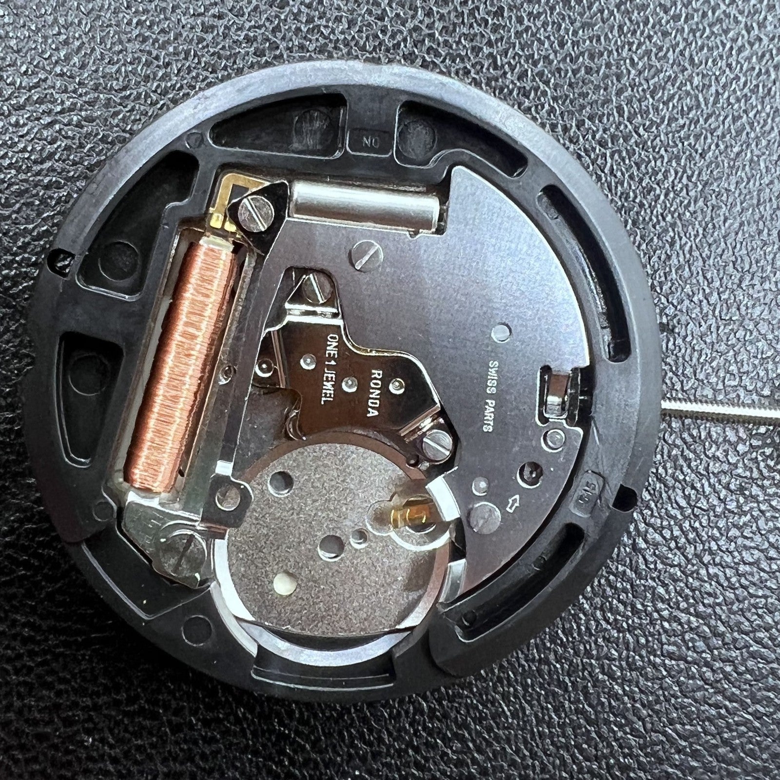 Swiss Ronda 515 quartz movement with HCP3 black disk and date display at 3 o?clock.