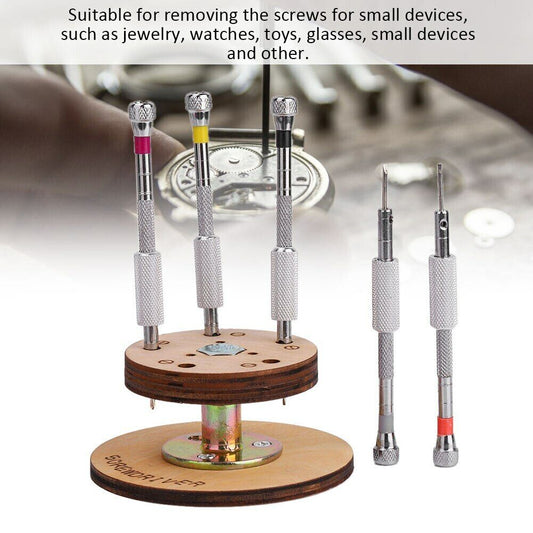 1. Set of 5 steel screwdrivers with rotary stand base for precision watchmaker tasks.