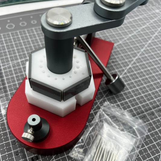 Red swivel tool for removing watch band screw pins, fits 0.6mm-1.6mm links, brand included.