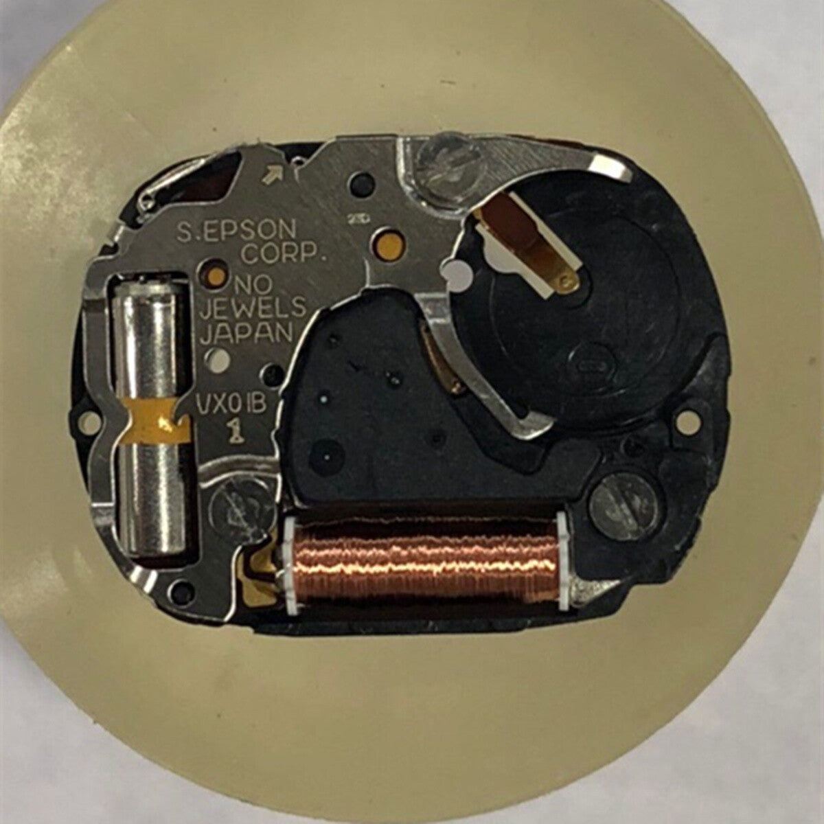 Set of 2 Hattori VX01 quartz watch movements with 3 hands and stems, precision Japanese craftsmanship.