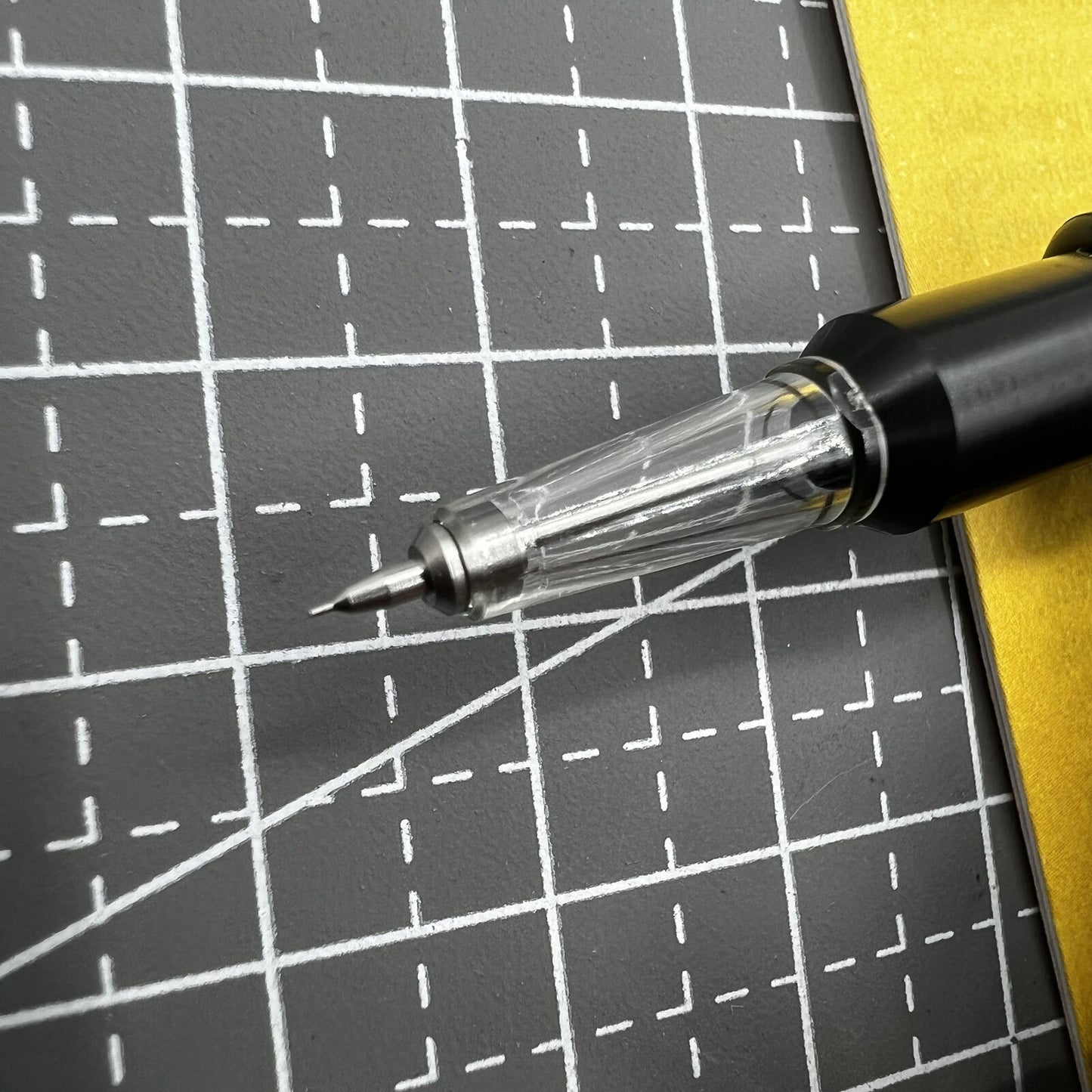 Swiss Tool Bergeon 7720-5 automatic watch oiler with fine tip for precise watch maintenance and repair tasks.