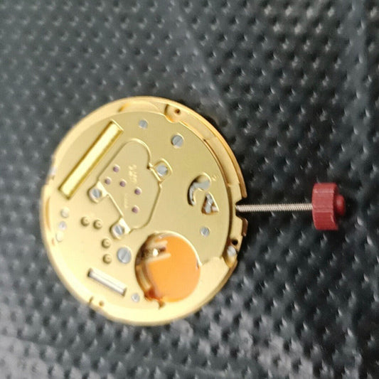 Ronda 1016 Swiss quartz watch movement with date display at 6 o'clock position.