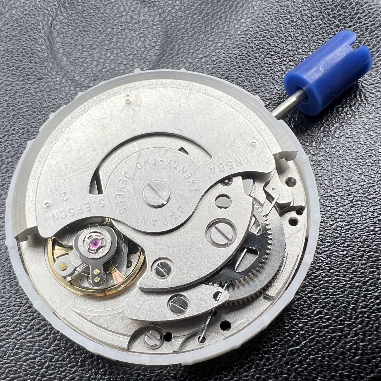 Japan Epson YN56 mechanical watch movement displaying date and day for precise watch repair tools.