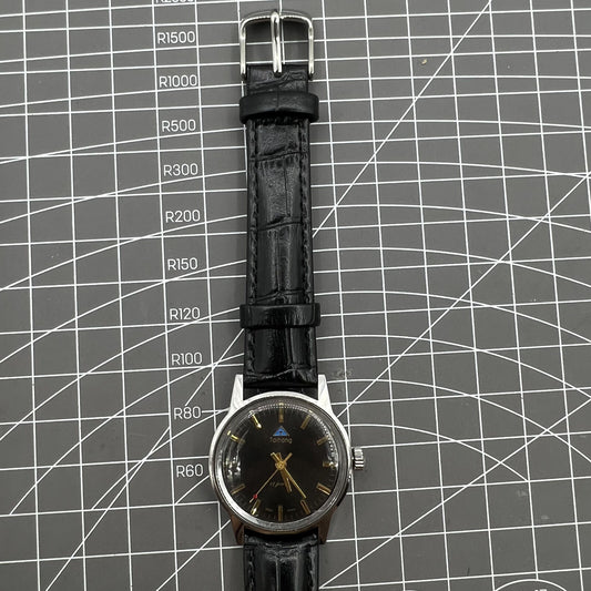 Taihang 32mm manual mechanical watch with black dial, golden nail markers, 17 jewels precision.