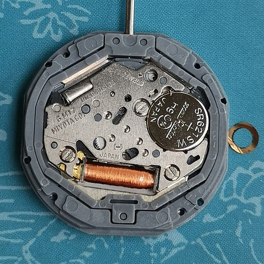 Japan Made Miyota 6M17 quartz watch movement with 4 hands, precision repair part for accurate timekeeping.