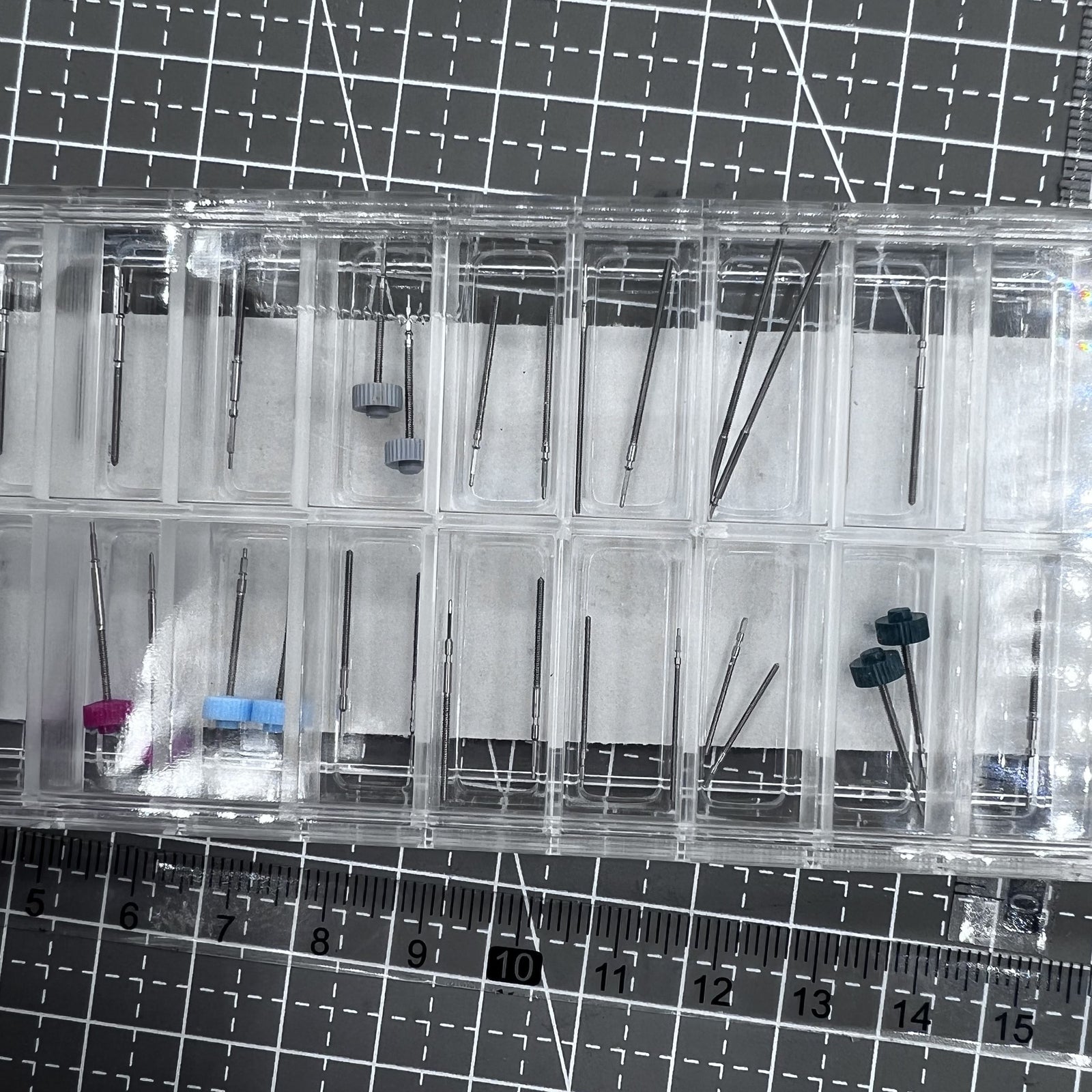 Set of 38 Ronda watch stems in 19 sizes for precise watch repair and replacement parts.