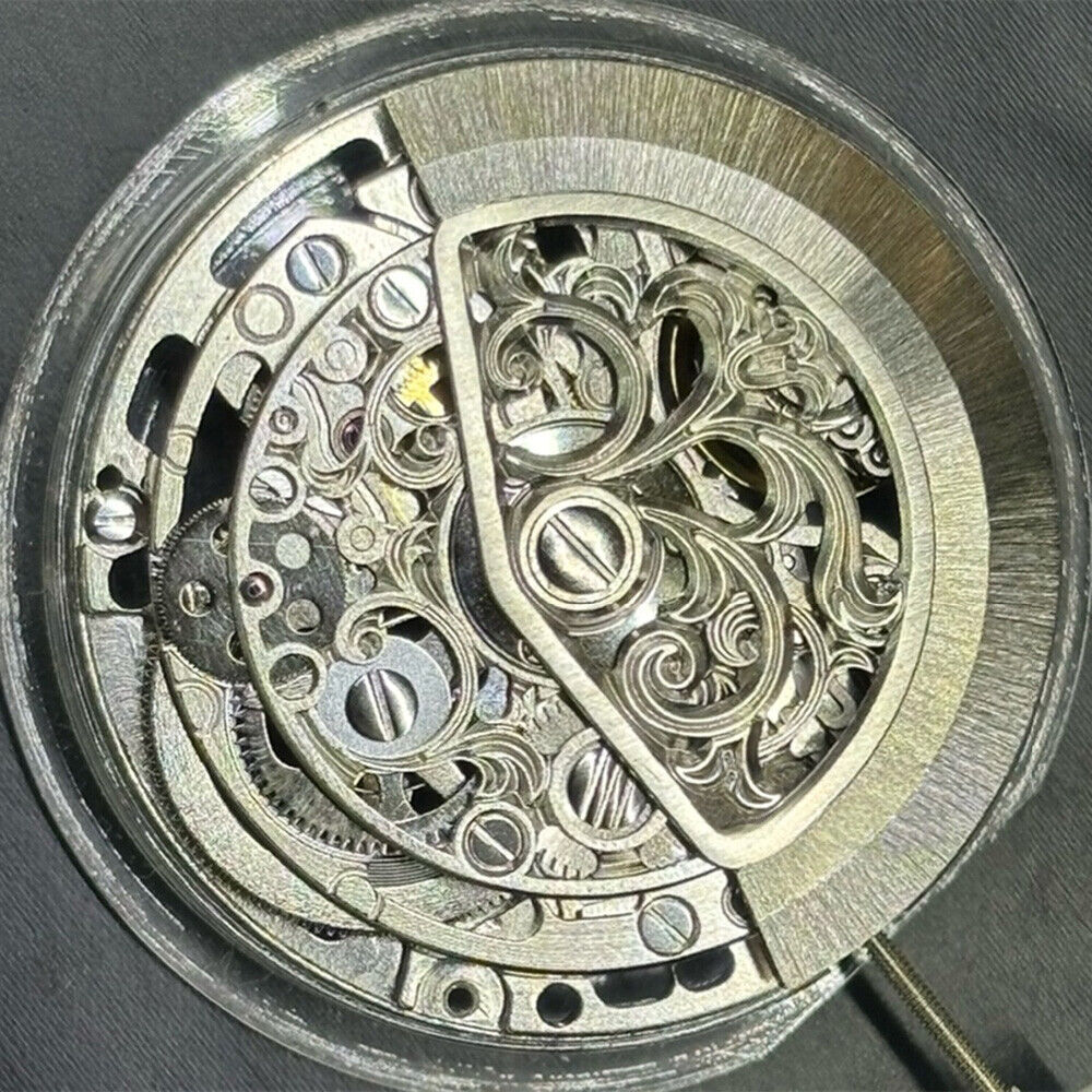 Silver hollow carved watch accessory with automatic 7750 mechanical movement for precise timekeeping.