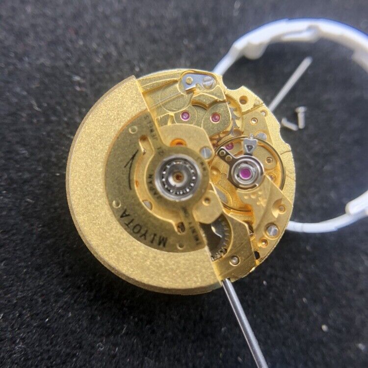 Miyota 6T51 golden plated automatic watch movement for accurate, reliable timekeeping performance.