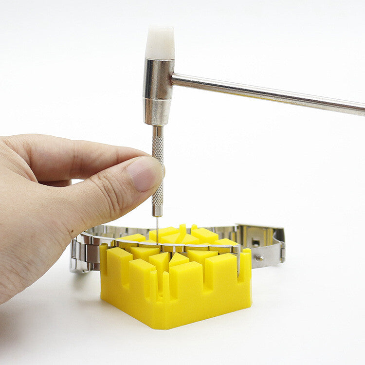 Durable watch band link remover kit with hammer and strap holder for precise watch repair.