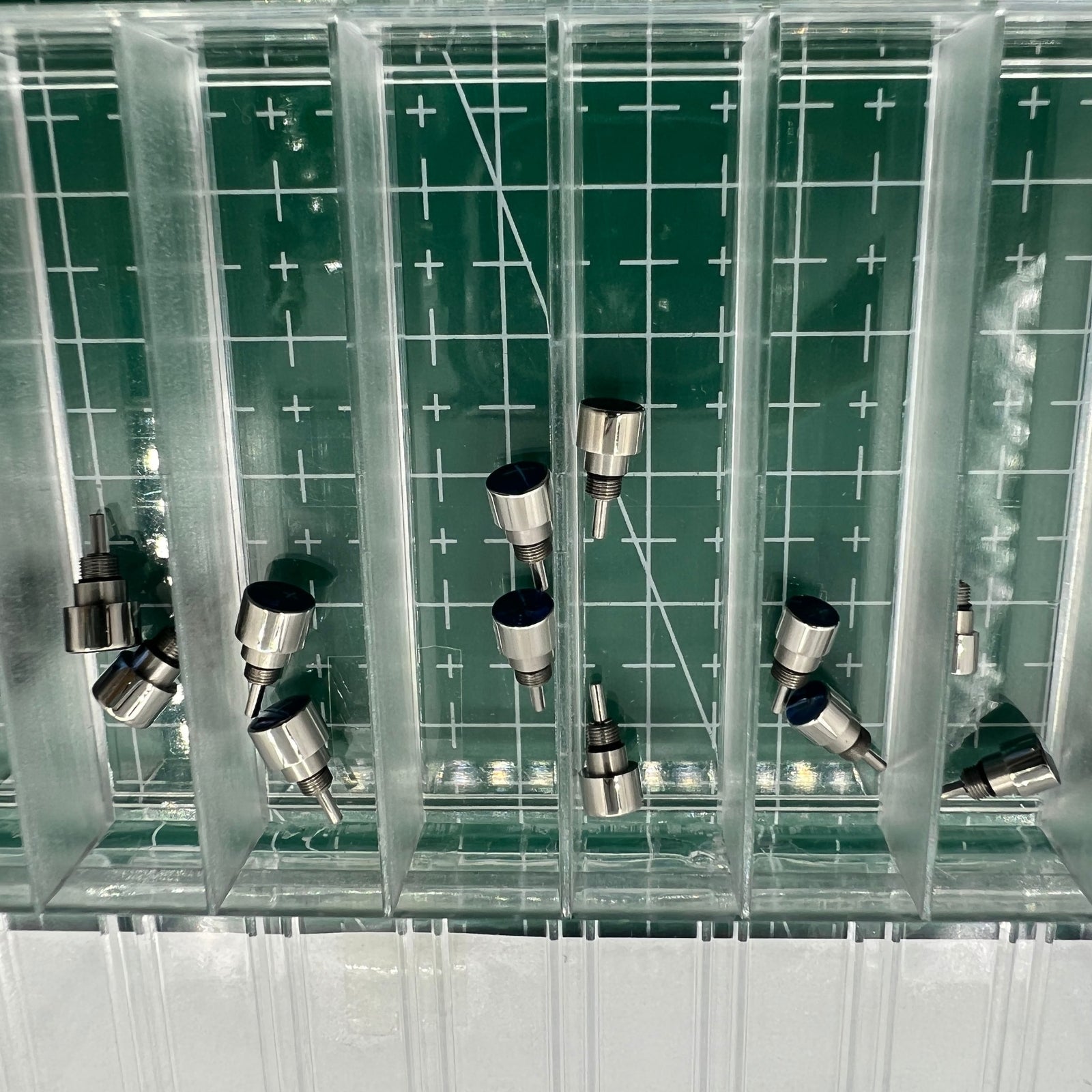 Silver stainless steel wholesale watch with classical pusher design, perfect for elegant timekeeping.