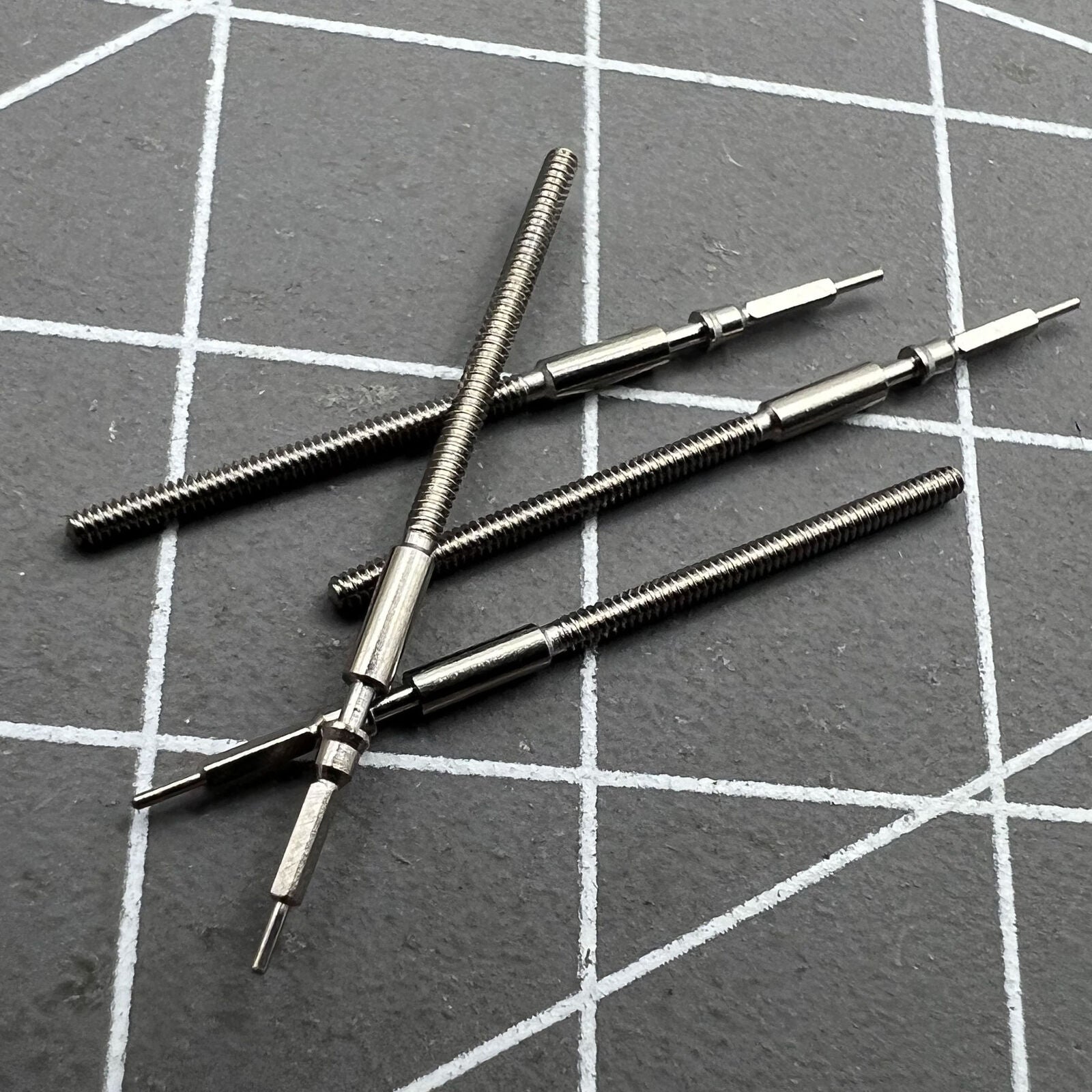 Replacement winding stem for Miyota 9100 and 9132 mechanical watch movements, durable fit.