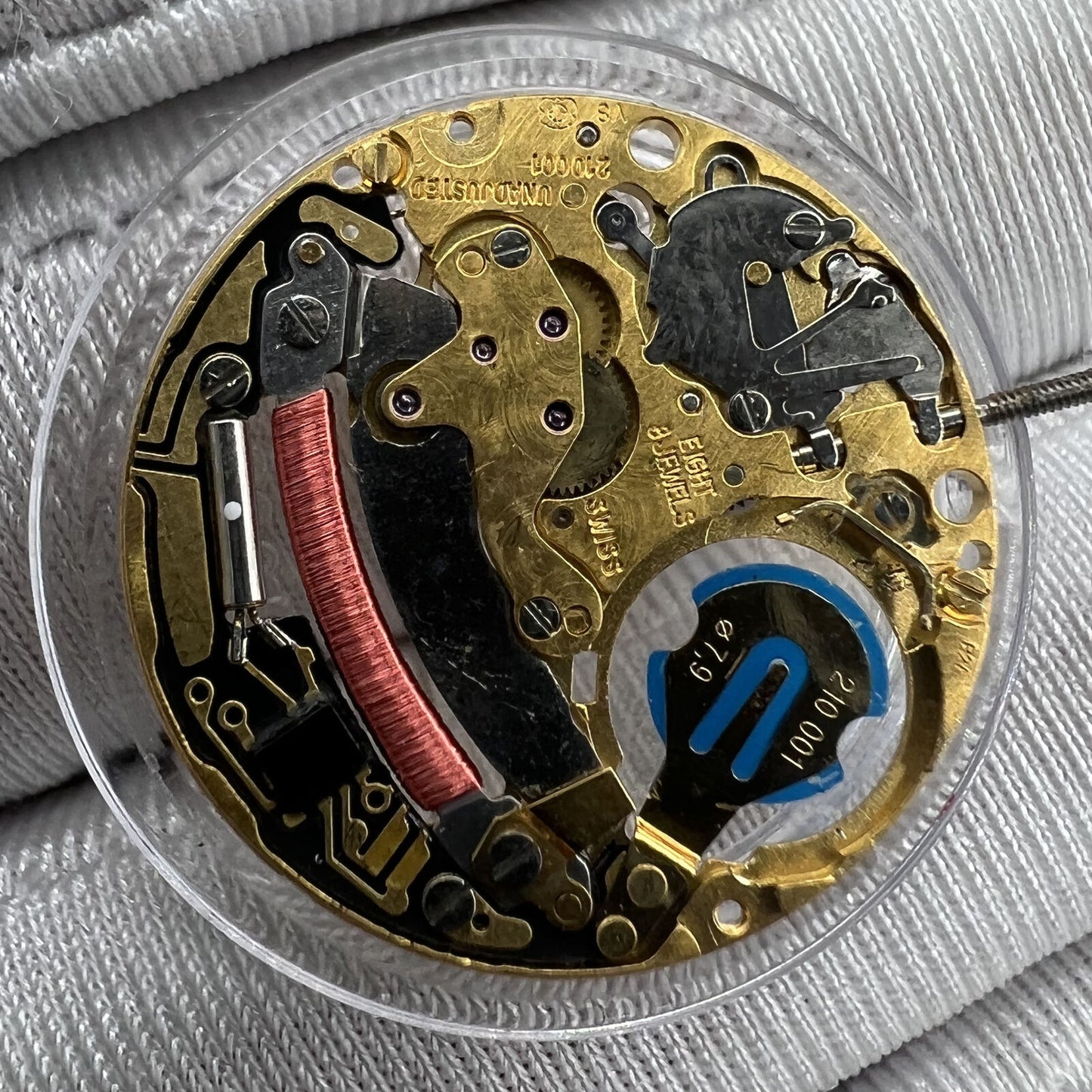 Swiss Made ETA 210.001 quartz watch movement showing precision 2-hand design by ETA for watch accessories.