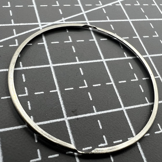 Steel watch case cushion mount spacer ring for SW200/220 SW240 movement, enhancing accessory fitment.