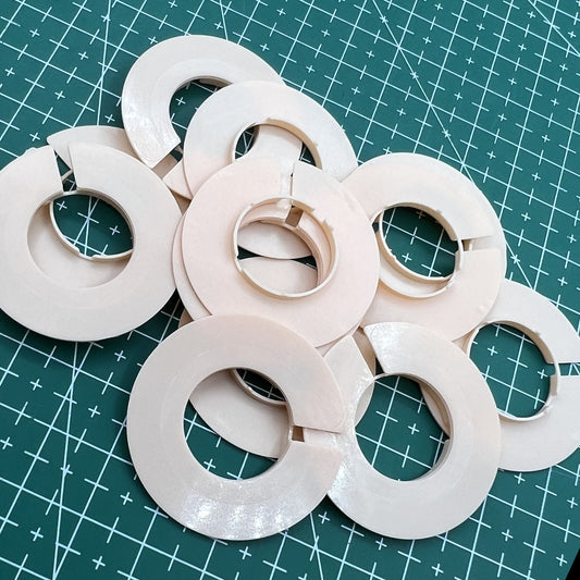 Watch accessory set featuring 12 spacer rings for casing, compatible with 7.75mm movements, brand AC.