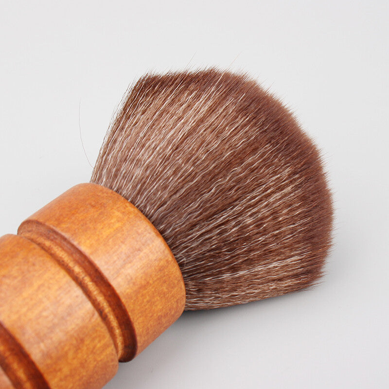 Soft antistatic brush by Different for precise dust cleaning in watch repair and maintenance.