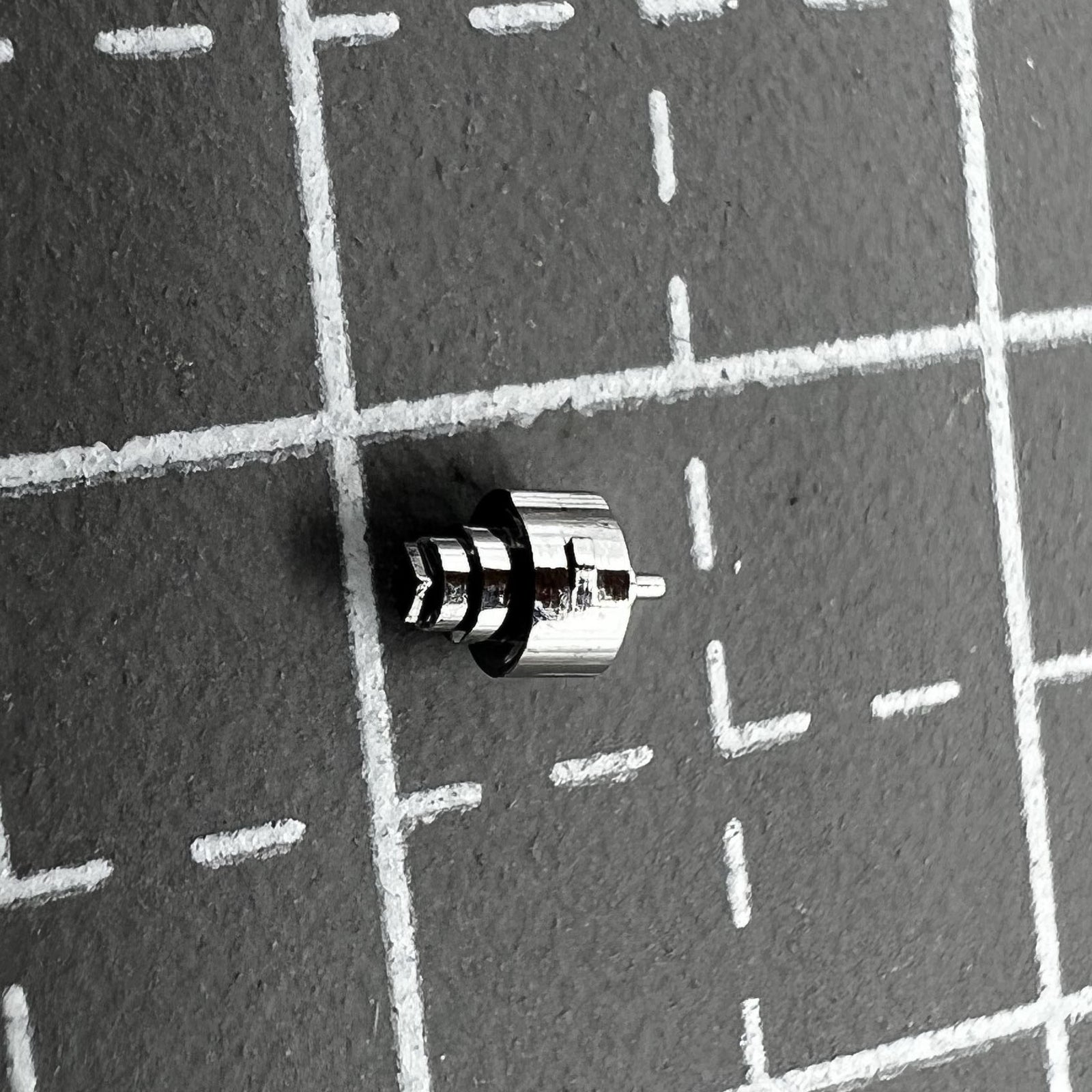 Original Axis of Barrel with complete mainspring for Omega 3313/3303 watch movement, precision part by Omega.