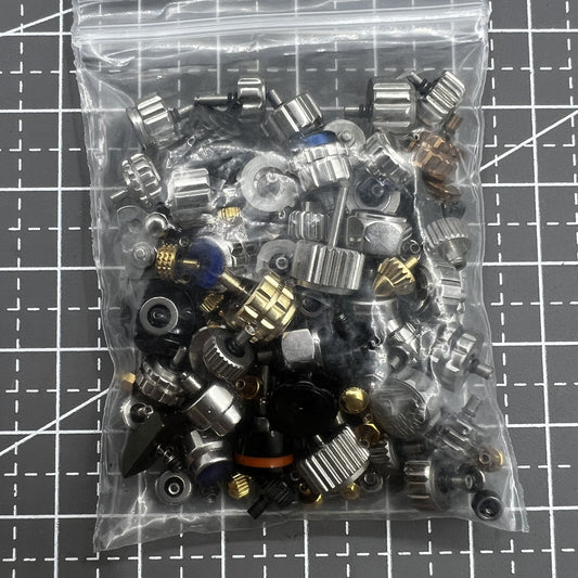 Assortment of 100 watch crowns in multiple sizes, perfect for watch repairs and replacements.
