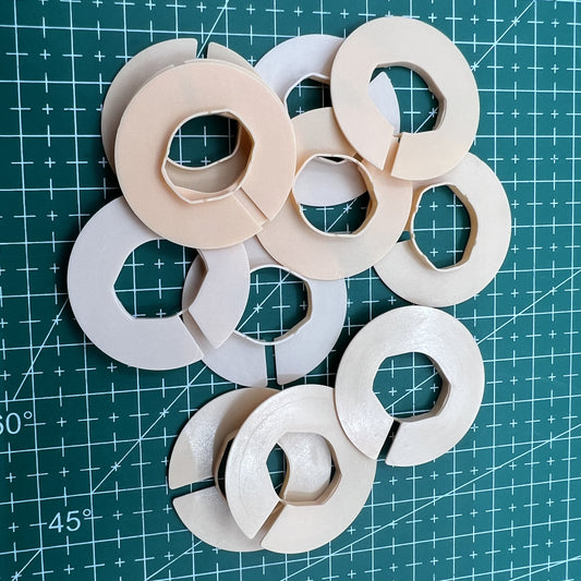 AC-676 12-piece watch movement case spacer rings, 4 sizes, durable holders for precise casing adjustments